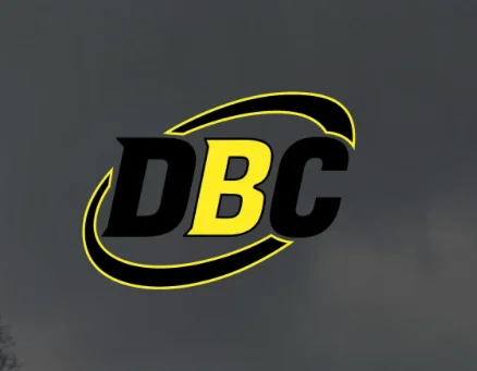 DBC logo with black and yellow lettering and curved swoosh design on gray background